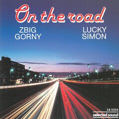 Album art for the SCORE album On The Road